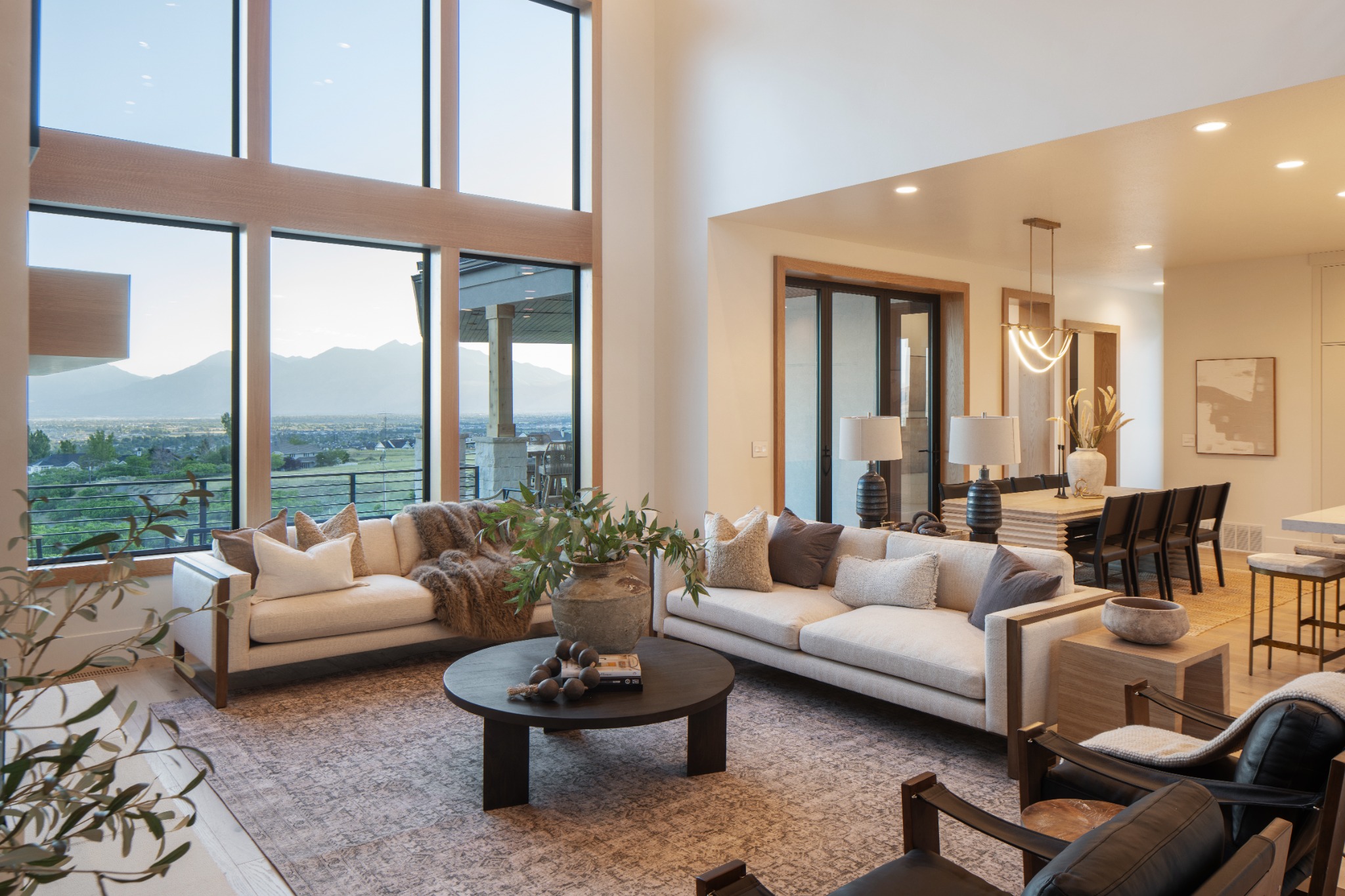 Luxury great room designed by DZYN Fusion Studio overlooking Utah mountains